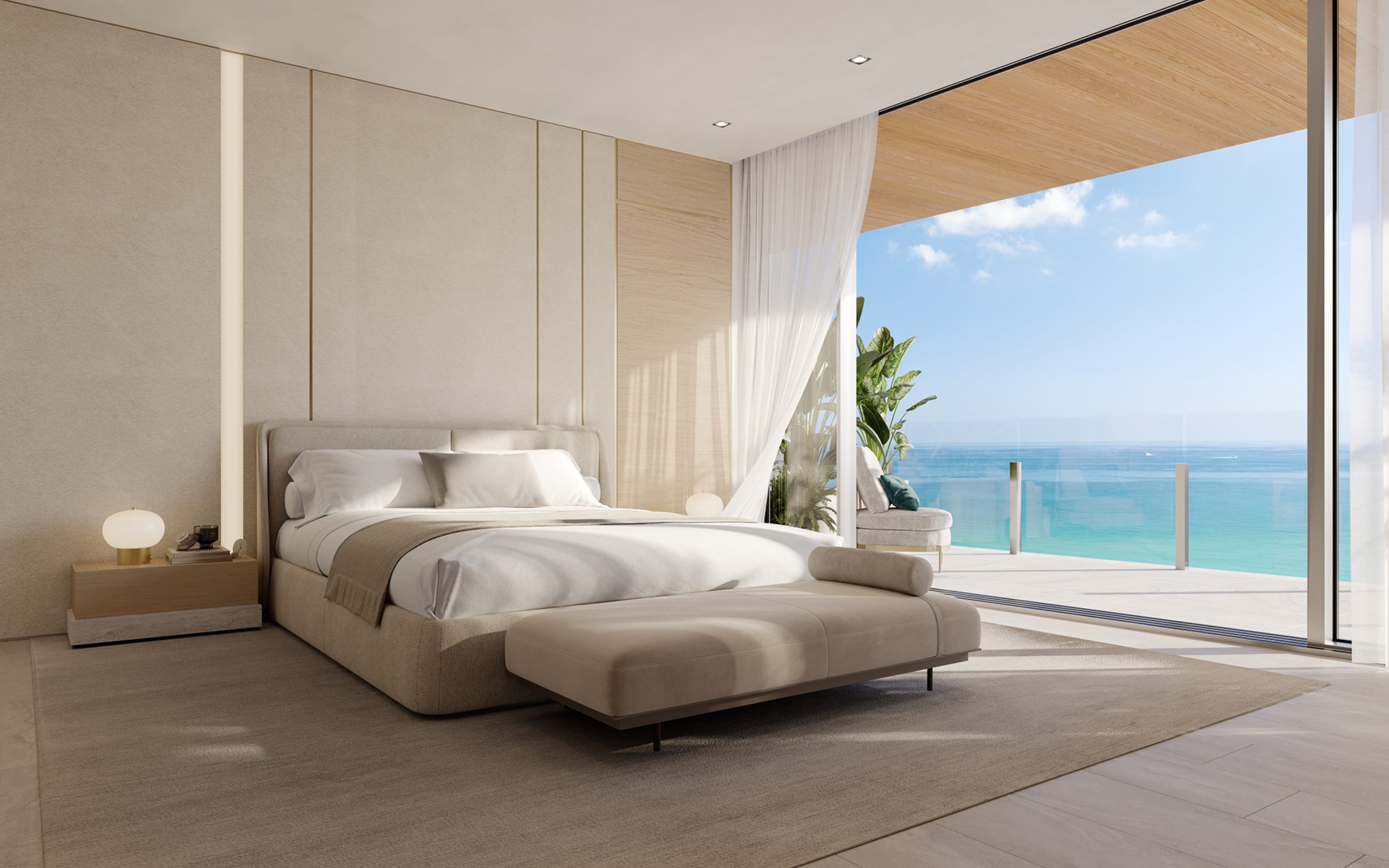 Bedroom with king bed, floor-to-ceiling window, and balcony with ocean view. at Ocean House Surfside luxury condos in Miami.